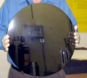 450mm silicon wafer held by scientist